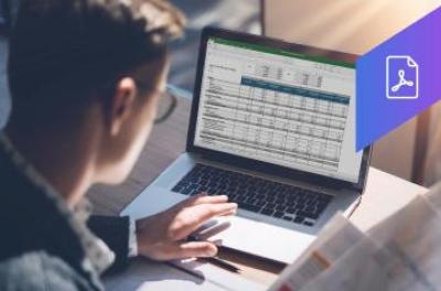 man at computer with pdf icon